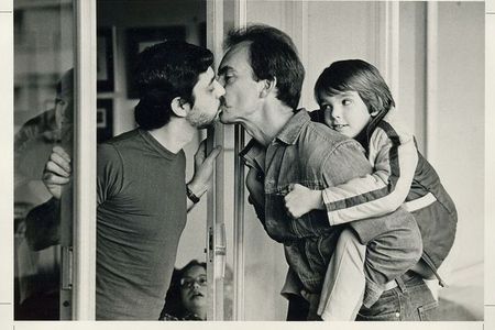 Gay Dads Kissing by J. Ross Baughman