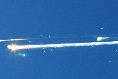 Debris from space shuttle Columbia streaks across the sky over Tyler, Texas, February 1, 2003.
