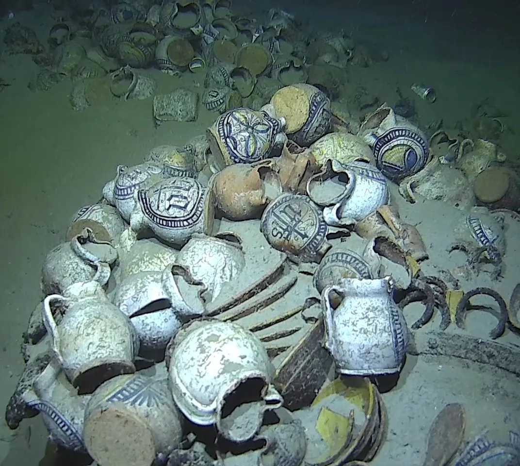 Underwater view of jugs on seafloor