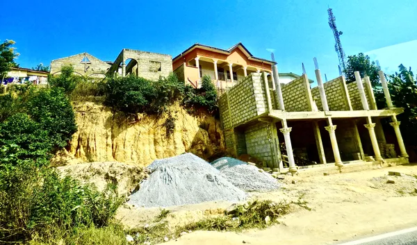 Curious New Housing Construction From the Ground Up While Window Watching on Drive to Elmina thumbnail