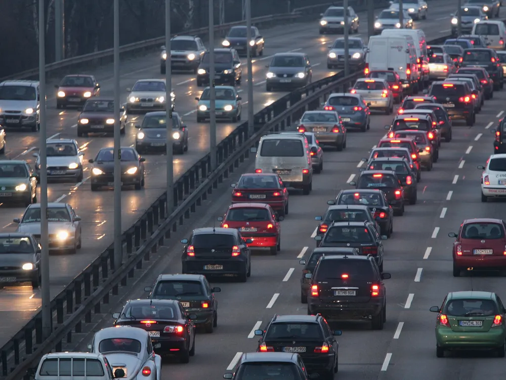 Car traffic on a road at night