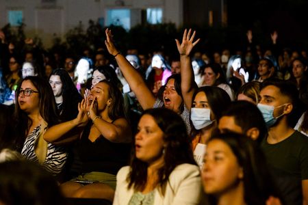 Concert attendees cheer at an event in Porto, Portugal, on August 15, 2020.