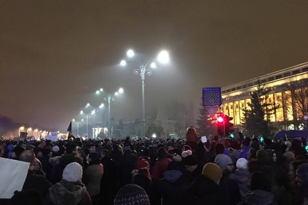 Romanians protest in Victoria Place in Bucharest on January 22.