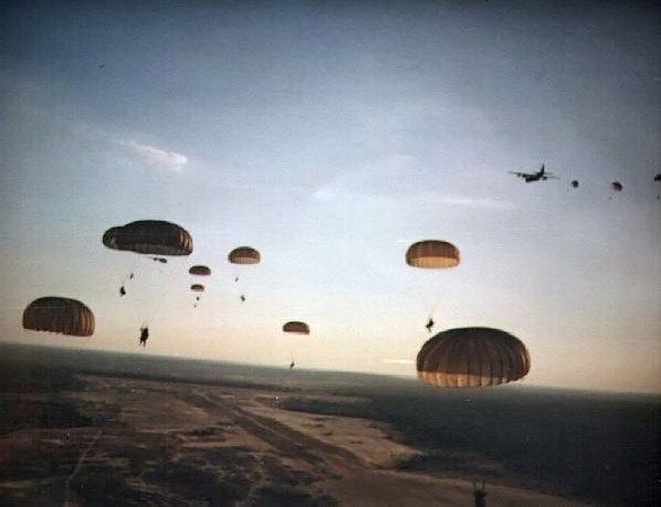 U.S. paratroopers drop into Grenada