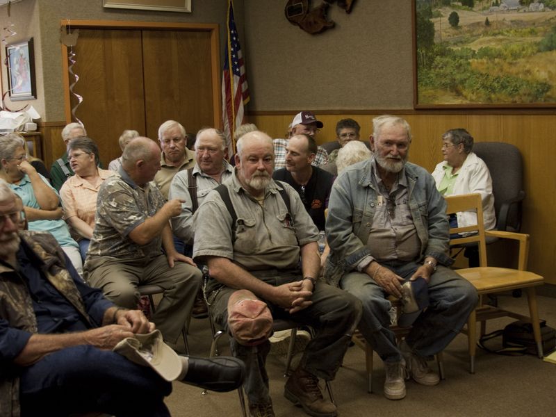 In Myrtle Point, Oregon, a group waits in the library to hear Howard