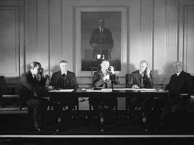 President Coolidge conducts the first official transatlantic phone call with the king of Spain in 1927