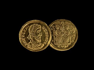 The coins are marked with the faces of nine Roman emperors.