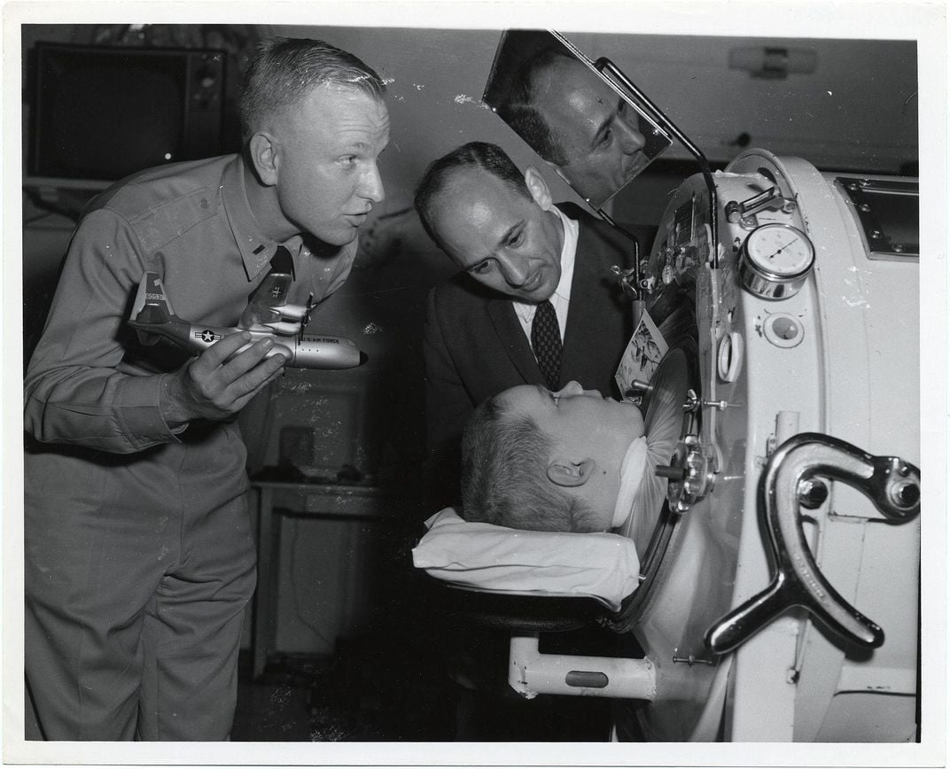 Polio victim in iron lung