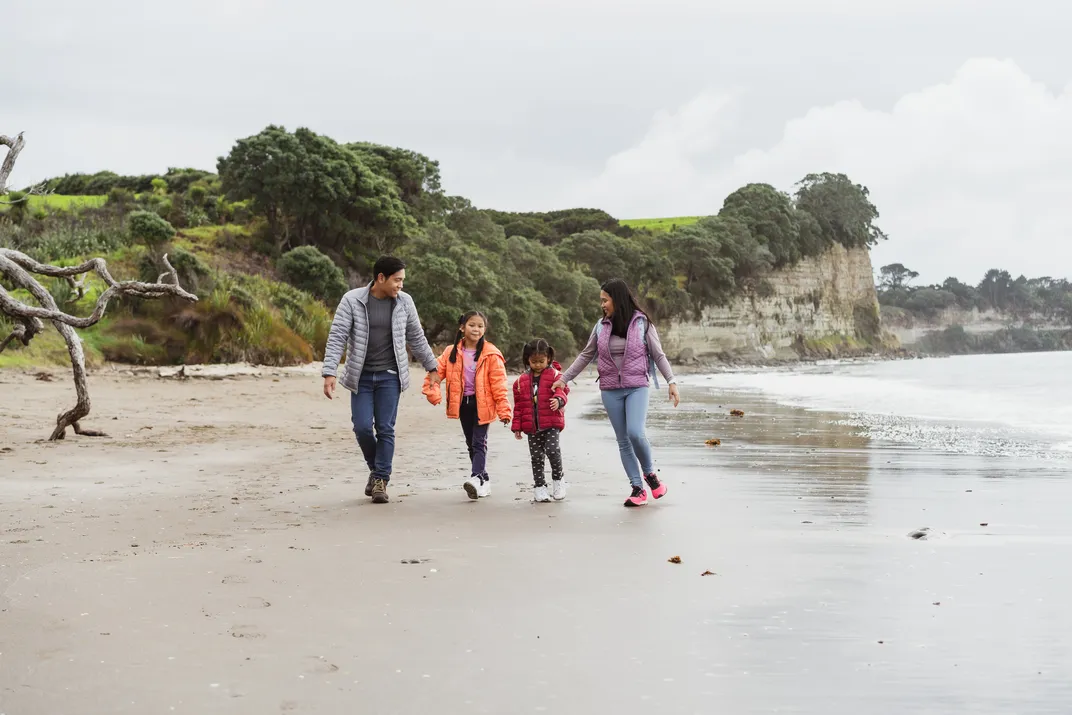 Family hike on the beach