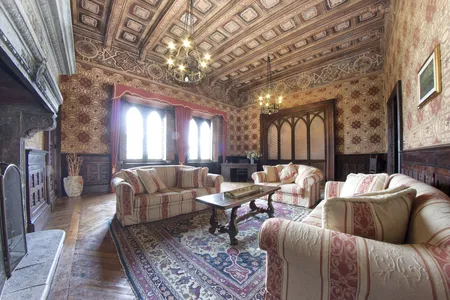 A sumptuously appointed room within the Borgia family's castle in Tuscany, now available for everyday people to rent.