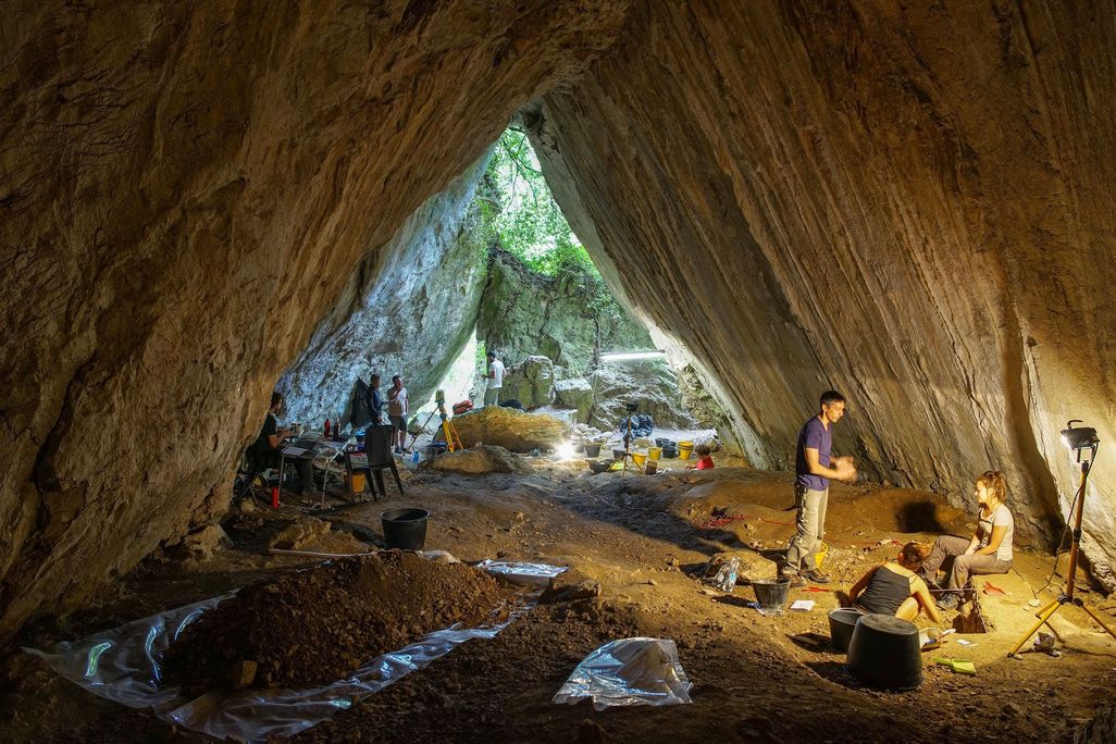 Excavators at the infant burial site in the Arma Veirana cave in Italy
