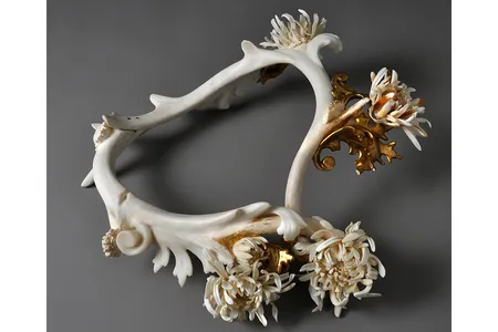 Marion’s Morifolium Neckpiece  by Jennifer Trask, 2011, includes sewing needles, antler, various teeth and bones and cast resin with bone powder, among other materials. 