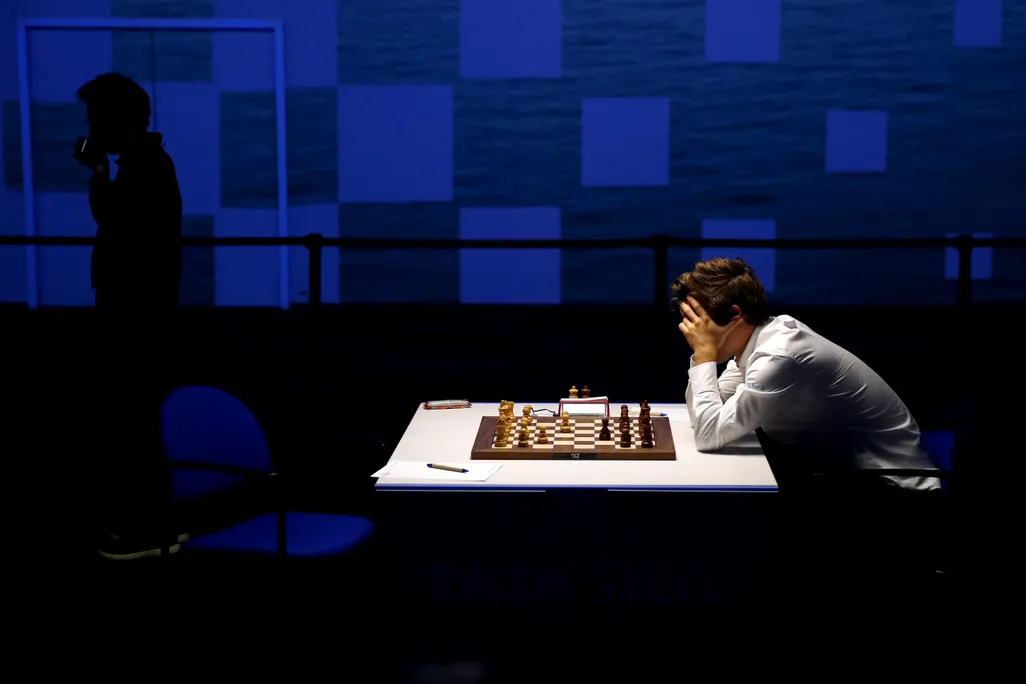 Magnus Carlsen of Norway competes against Fabiano Caruana of USA during the 83rd Tata Steel Chess Tournament held in Dorpshuis De Moriaan on January 27, 2021 in Wijk aan Zee, Netherlands.