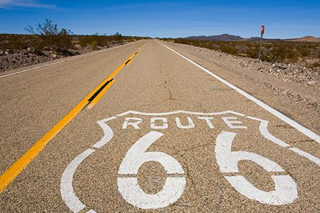 The 2,400-mile-highway "took us to places that we needed to be, not in a literal sense, but a more philosophical sense," says curator Roger White.