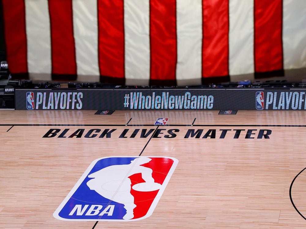 An empty court and bench seen shortly after the intended start of an NBA basketball playoff game between the Milwaukee Bucks and the Orlando Magic on Wednesday, Aug. 26. 