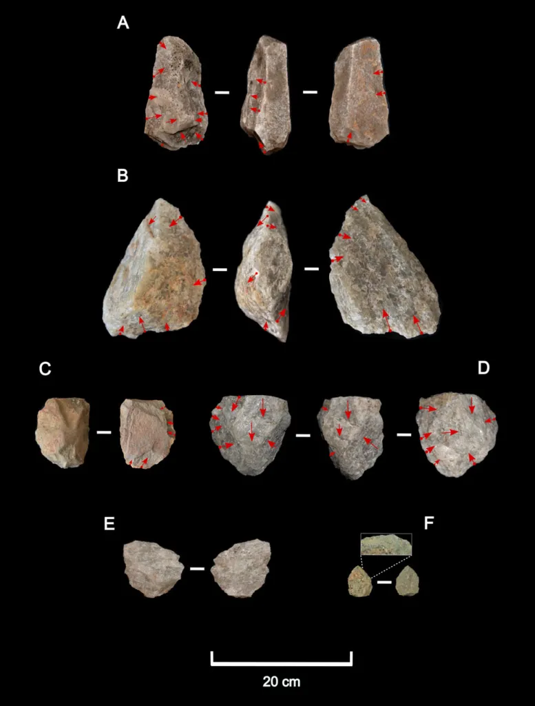 Stone tools on a dark backdrop