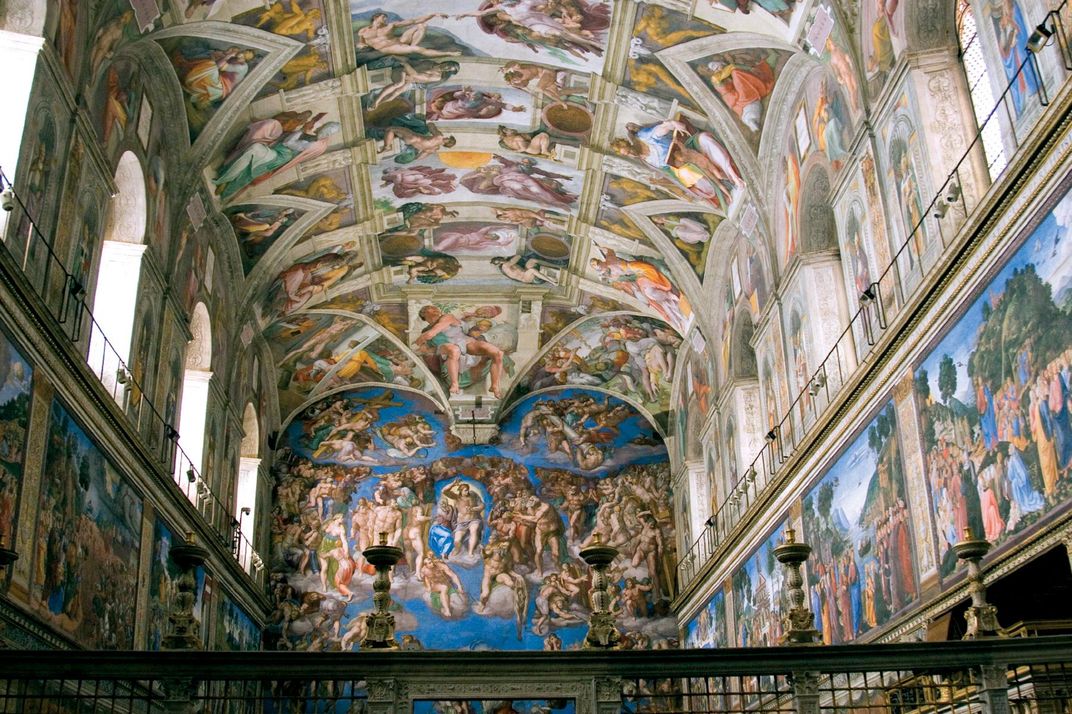 The Sistine Chapel's frescoed walls and ceiling
