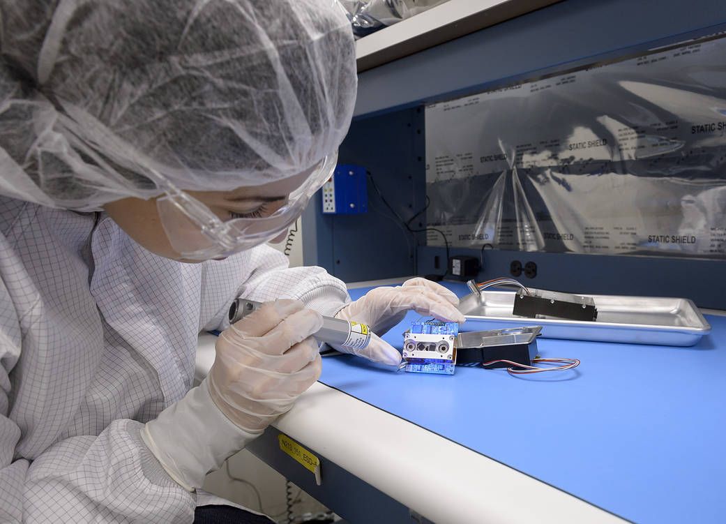 A scientist testing VIPER’s components in a lab