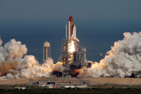 Launch of the STS-122 shuttle mission from Cape Canaveral. Re-entry is quieter, but more spectacular visually.