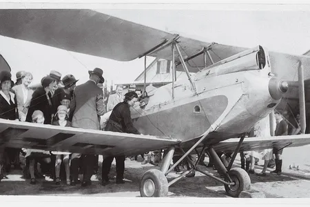 The year before her flight to England, Lores Bonney (in foreground at right) flew solo around Australia. She flew the same open-cockpit de Havilland Gipsy Moth on both flights. She told this story to the author several years before her death in 1994 at the age of 96.