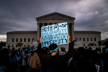 Protesters attend a rally in support of affirmative action in college admissions on October 31, 2022.