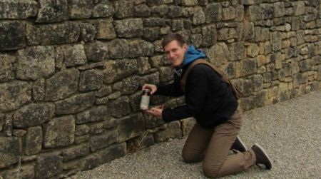 Ed Heseltine, a British traveler currently living in the Dordogne, shows the first of two beers that he found stashed months earlier by the author of “Off the Road.”
