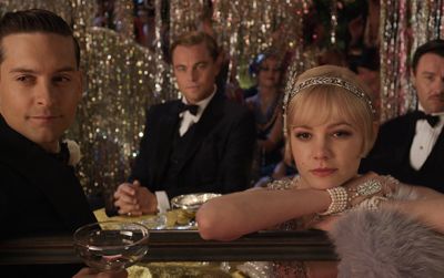 (L-R) Tobey Maguire as Nick Carraway, Leonardo DiCaprio as Jay Gatsby, Carey Mulligan as Daisy Buchanan and Joel Edgerton as Tom Buchanan in Warner Bros. Pictures' and Village Roadshow Pictures' drama "The Great Gatsby," a Warner Bros. Pictures release.