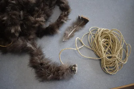 Early Puebloans wove turkey feathers into yucca fiber to make the blanket.