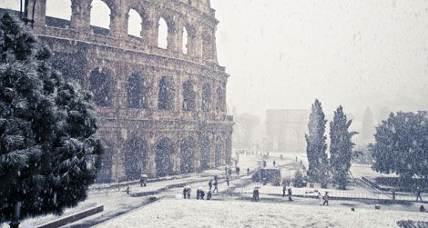 A freakishly cold winter coated Rome's Colosseum in snow