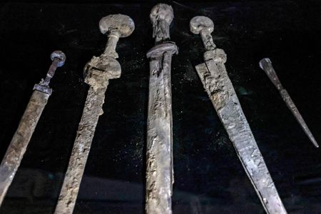The four swords in their showcase during an announcement event on September 6