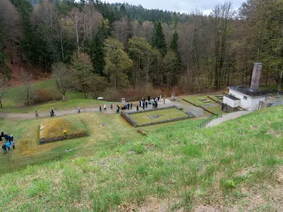 Visitors lay wreaths at the &ldquo;Square of Nations,&rdquo; a memorial site at the former Flossenb&uuml;rg concentration camp&rsquo;s crematorium, on April 24, 2022.