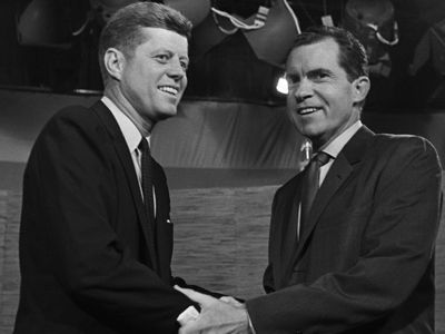 07 Oct 1960, Washington, DC, USA --- Presidential candidates John F. Kennedy and Richard Nixon shake hands after their televised debate of October 7, 1960. The two opponents continued their debate after the cameras had stopped.