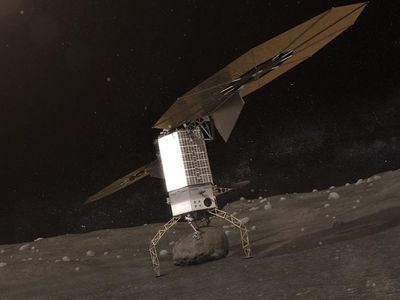 The Asteroid Redirect Vehicle gets ready to push off from the asteroid after grabbing a boulder in this artist’s interpretation