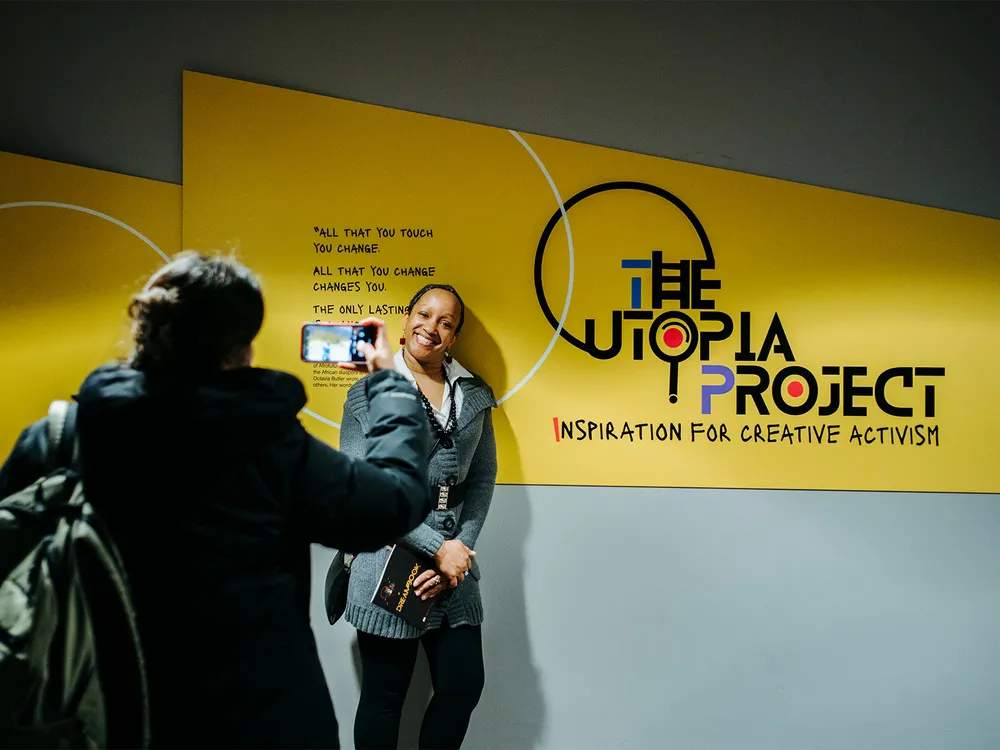 Visitors Make a Selfie at Utopia Project entrance