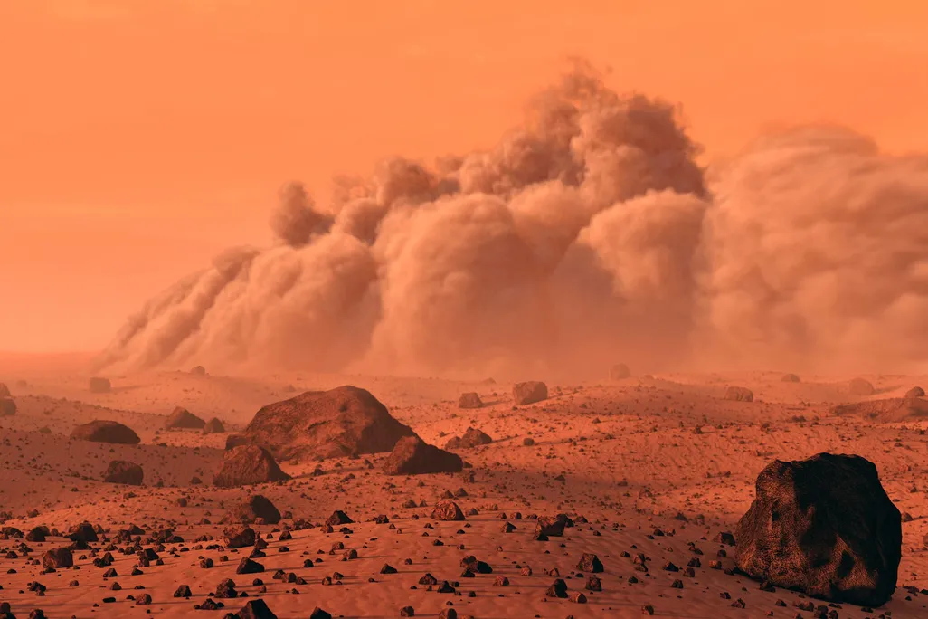 An auburn-colored ominous Martian landscape with a dust cloud rolling in. 