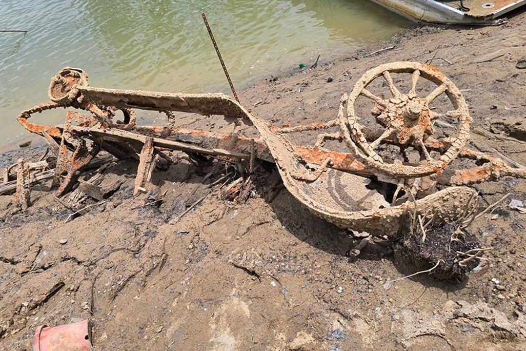 Old vehicle covered in mud