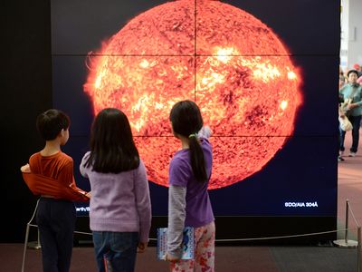 The 7-by-6-foot video wall on view at the National Air and Space Museum closes the 93 million mile gap between the Earth and the Sun.