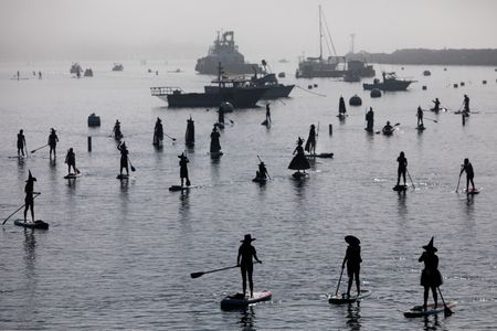 Around Halloween, hundreds of revelers dress up as witches and warlocks and hit the water.


