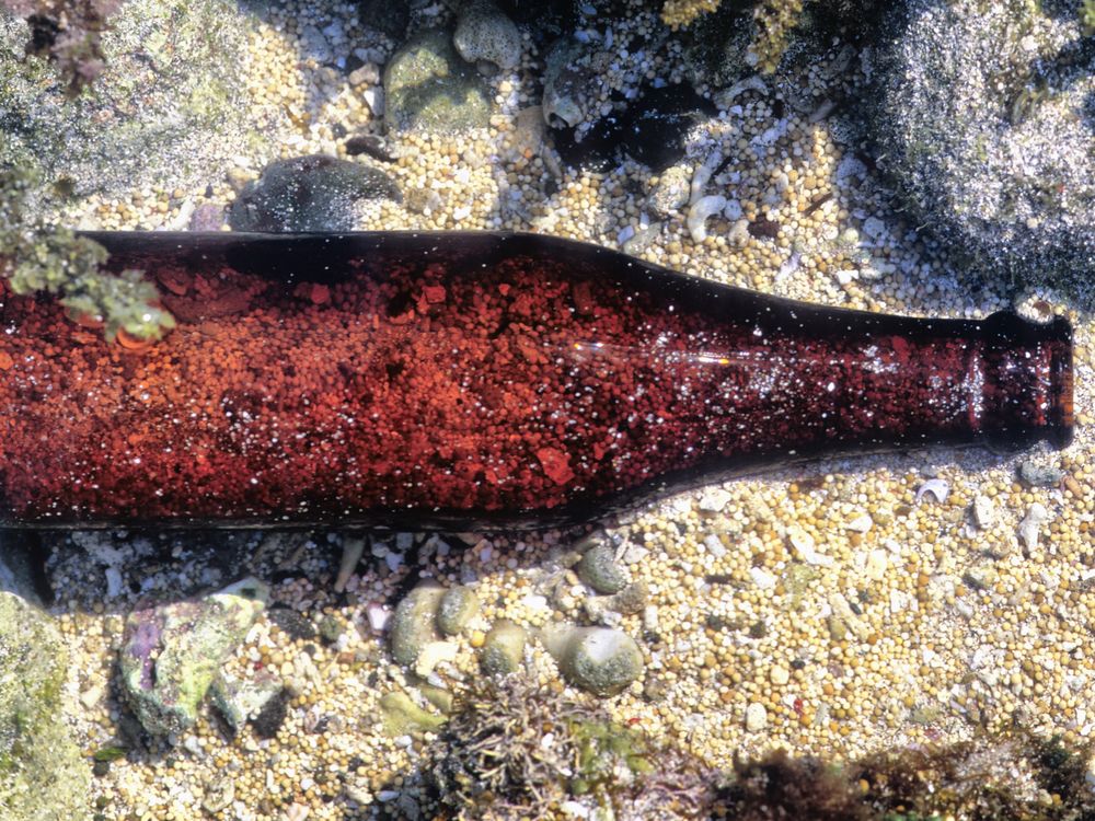 bottle on ocean floor