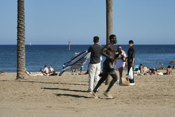 Intersecting Lives on Barcelona Beach thumbnail