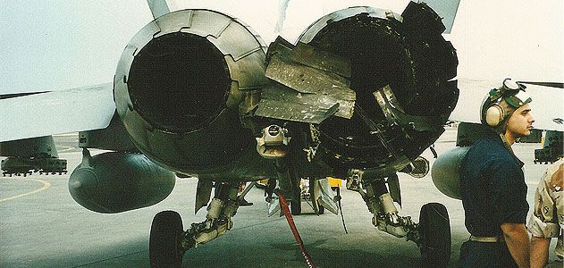 The starboard engine on the author’s F/A-18D takes licking, keeps ticking after a February 21, 1991 Iraqi missile strike.