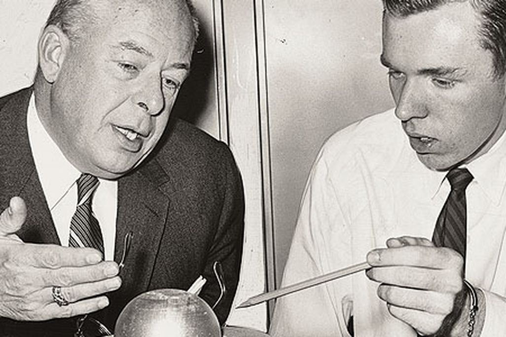 Kauffeld and Bruce Tully discuss a model that Tully built in his high school shop class.