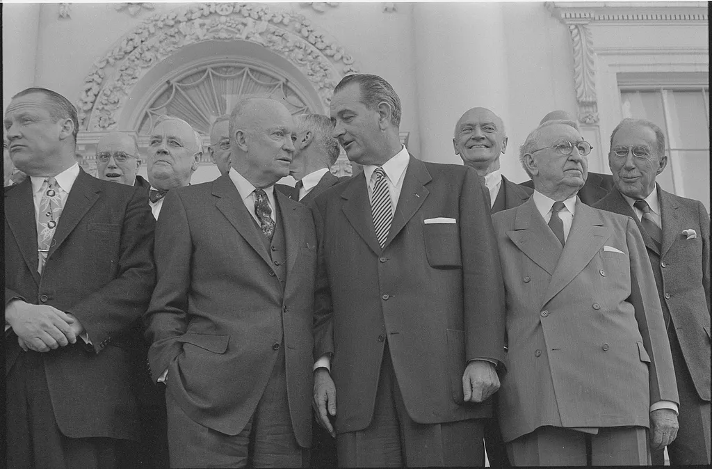 President Dwight D. Eisenhower (second from left) with Lyndon B. Johnson (center) and other guests during a bipartisan luncheon at the White House in 1955