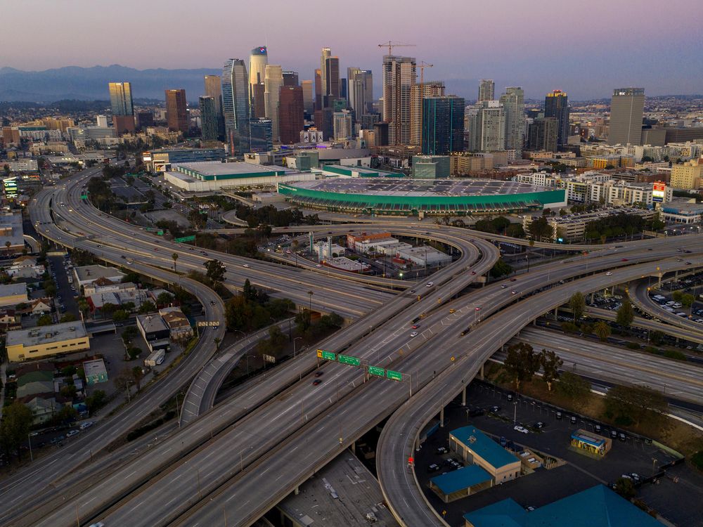 An aerial view of extremely light traffic on Los Angeles' 10 and 110 freeway interchange.