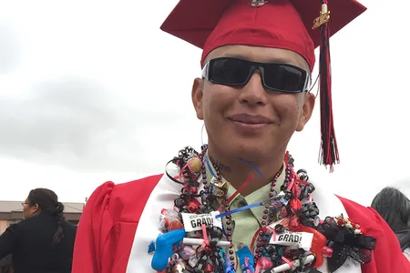 Graduate Fernando Yazzie after the ceremony at Navajo Technical University.