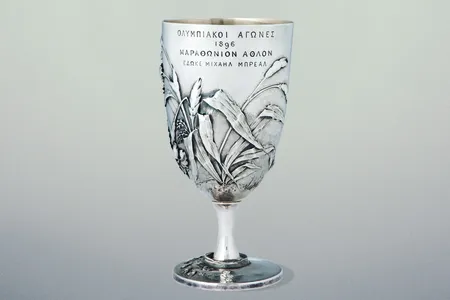 The Br&eacute;al Cup, designed by French scholar Michel Br&eacute;al, was awarded to the winner of the first Olympic marathon.