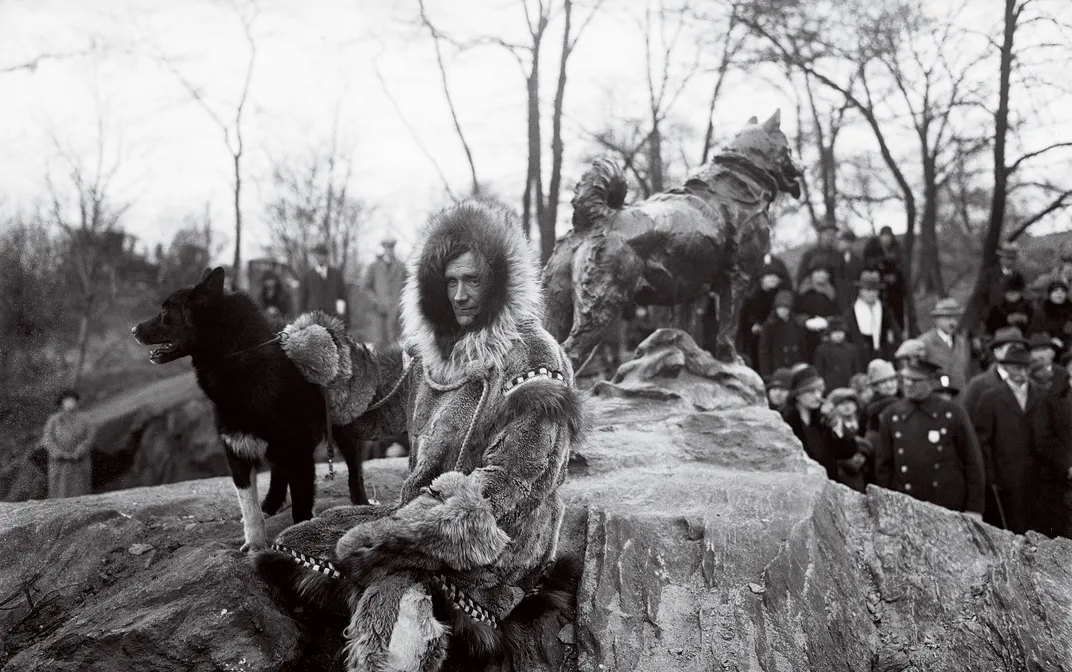 Balto, the actual dog, stands near the statue of him in Central Park