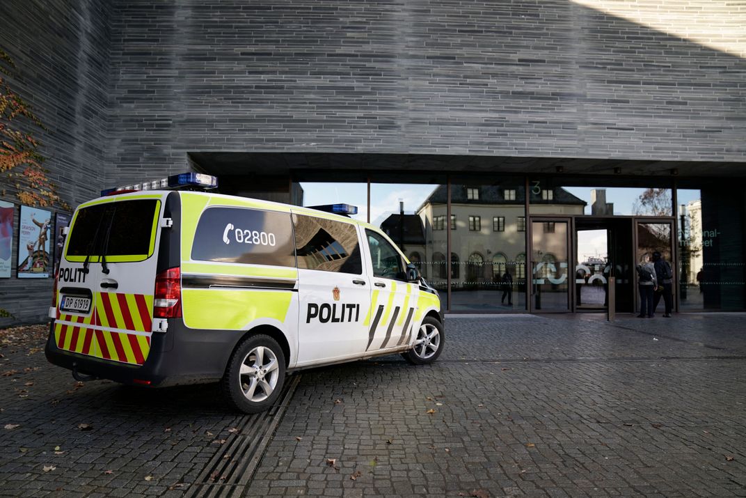 A police car stands outside the National Museum