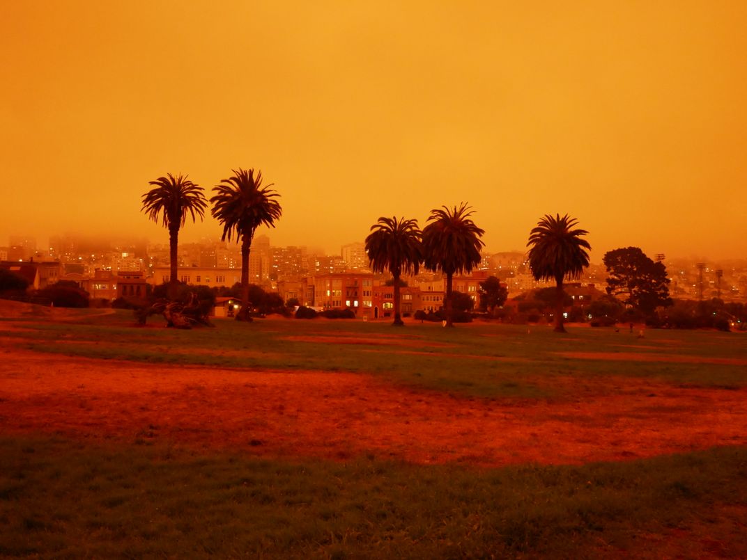 Orange skies cloak Fort Mason Park in San Francisco.