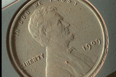 The Mars Curiosity rover needs a way to keep its instruments calibrated, so for the Mars Hand Lens Imager (MAHLI), it keeps a U.S. penny aboard. The camera took this ultra-high resolution image on October 2, showing all the Martian dust it's collected in just over a year on the planet.

Image: NASA/JPL-Caltech/MSSS/Planetary Science Institute